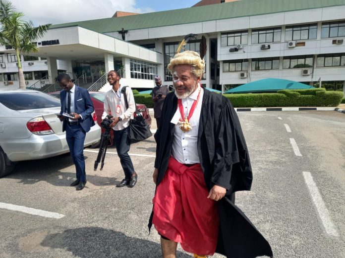 Drama as human rights lawyer attends Supreme Court proceedings in traditional worshippers’ attire (Photos))