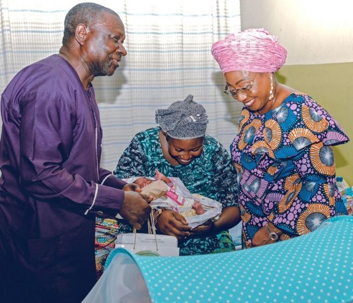 Erelu Bisi Fayemi visits triplets born to retired Anglican Priest at EKSUTH