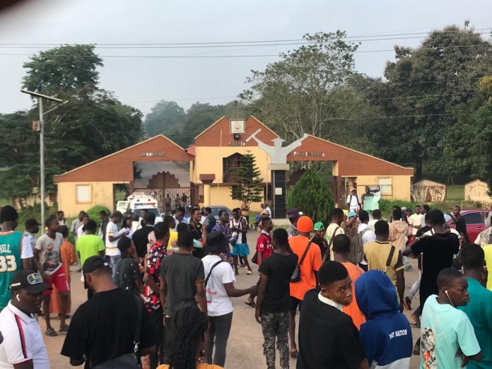 Students storm the streets of MAPOLY in protest over a fee increase