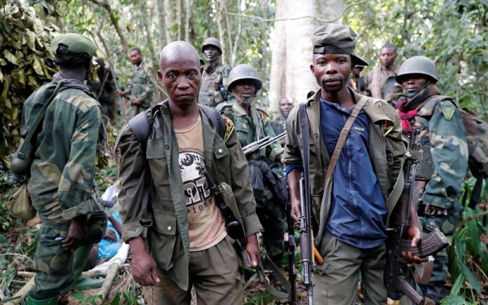 Militants kill 42 people in a school attack in western Uganda