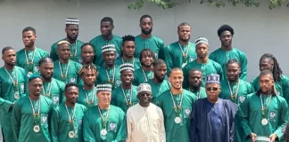 Tinubu confers national honours on Super Eagles, gifts them lands in Abuja