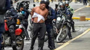 AFP__20240904__36FG78Y__v1__HighRes__HrwReportsWidespreadRightsViolationsInVenezuela-1725429528-300x168 Venezuelan Police Launch Manhunt for Alleged U.S. Collaborators After Maduro, Flores Capture